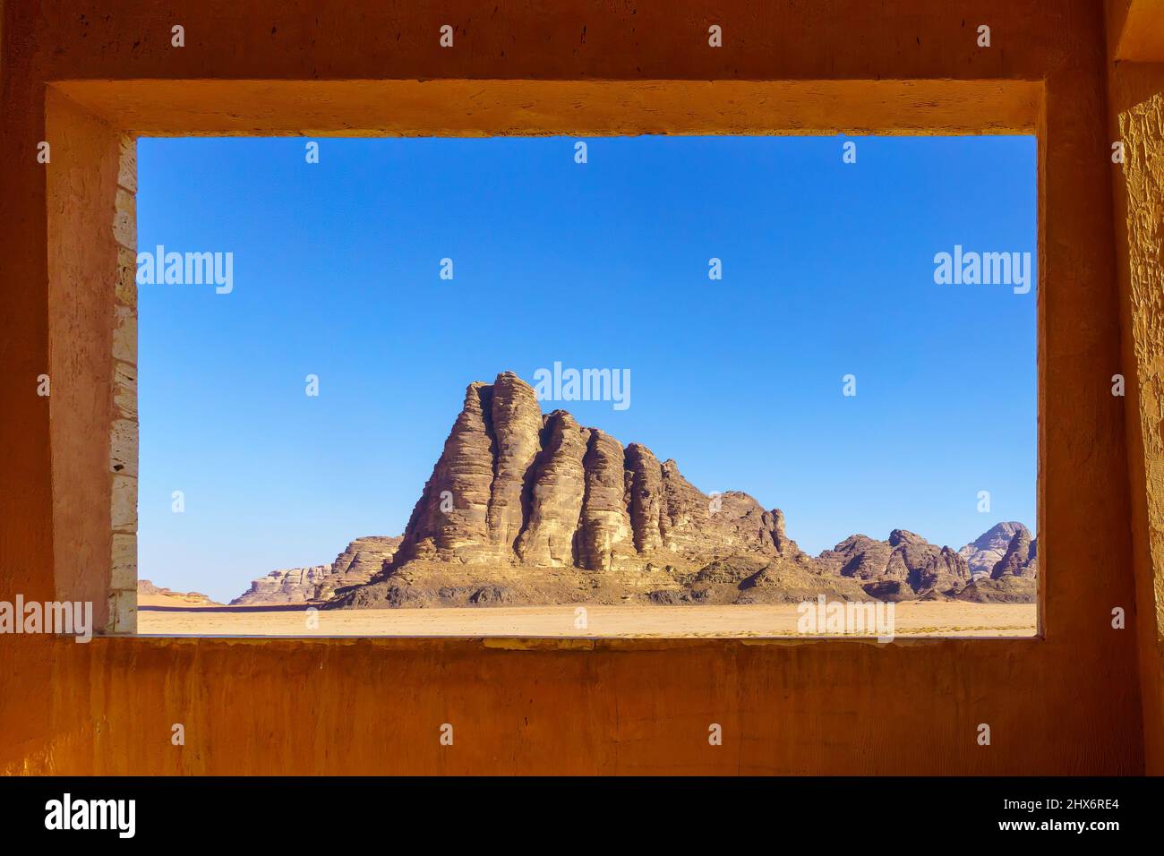 View of the Seven Pillars of Wisdom rock formation via a window in a