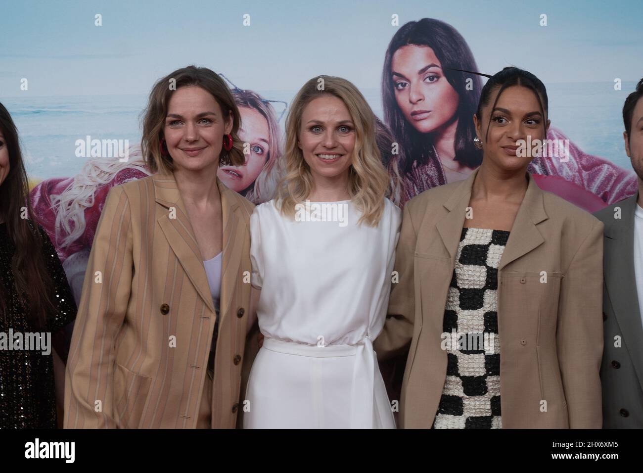 The three main actress Luise Heyer, Teresa Rizos and Taneshia Abt on the Red Carpet. On March 9, 2022, the premiere of the film 'JGA Jasmin Gina Anna' took place at the Mathaeser in Munich. The main roles are occupied by Luise Heyer as Jasmin, Taneshia Abt as Gina and Teresa Rizos as Anna. (Photo by Alexander Pohl/Sipa USA) Stock Photo