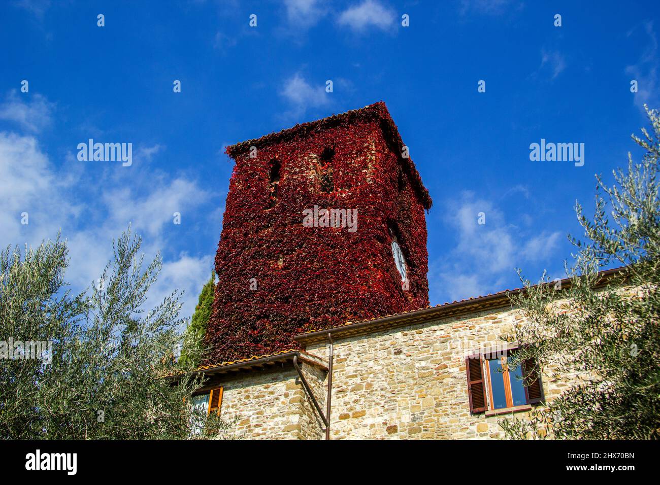 Red clock tower, Frontino Stock Photo Alamy
