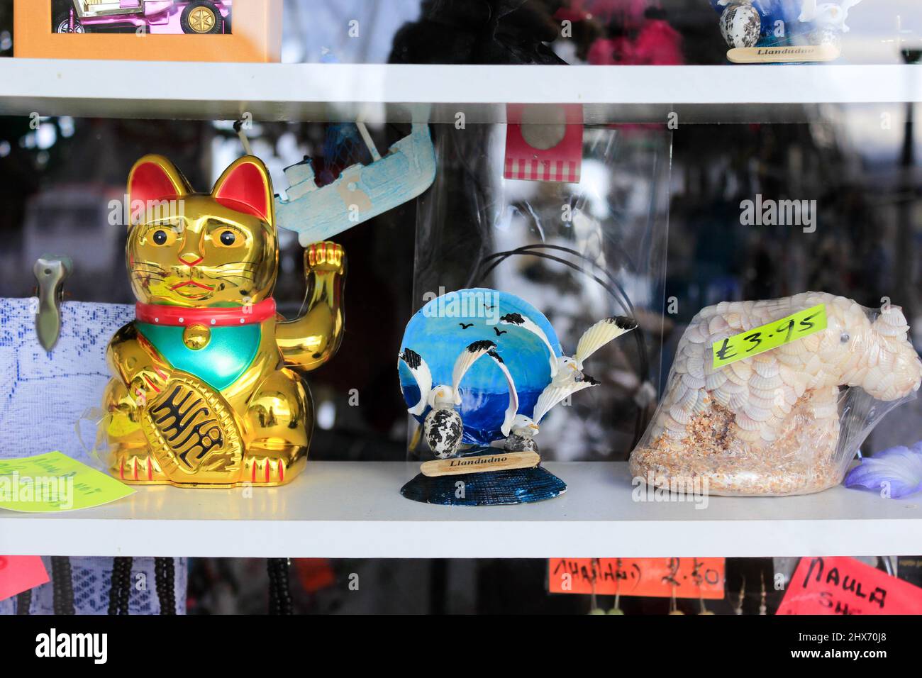Seaside town, souvenirs, Chinese waving cat Stock Photo