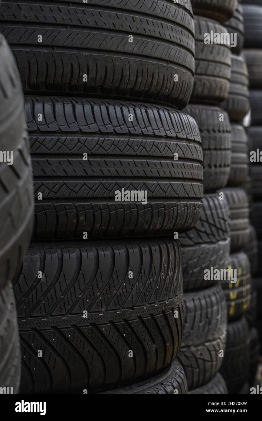 Old tires stacked in a tire shop yard Stock Photo Alamy