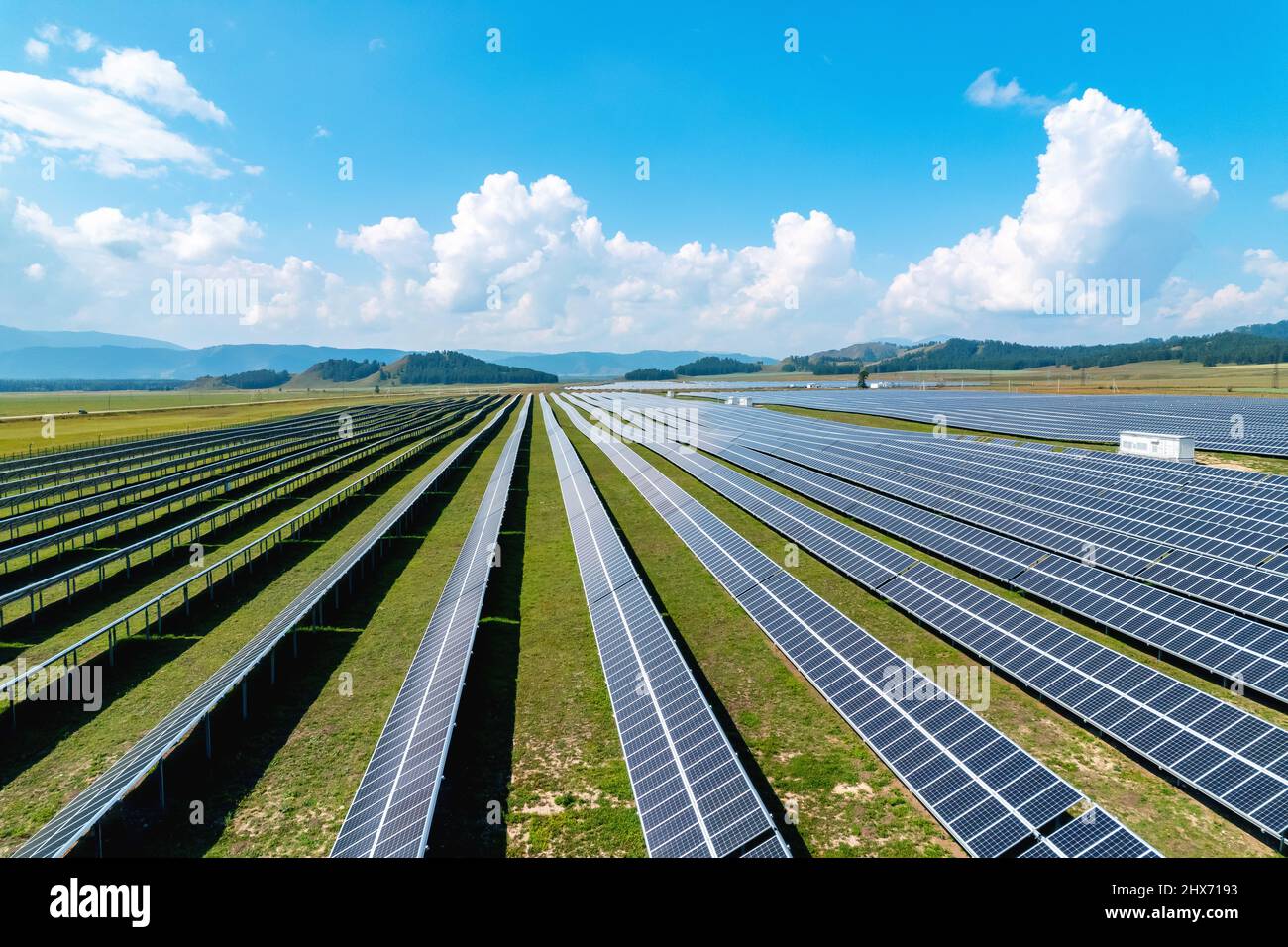 Solar panels on sunny day aerial top view, power farm producing clean ...
