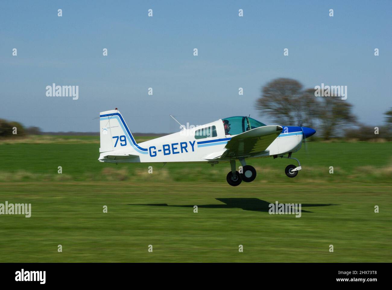 Grumman AA-1B G-BERY 'Race 79' taking off from Great Oakley airstrip in Essex to compete in the Royal Aero Club Air Race. Small private plane Stock Photo