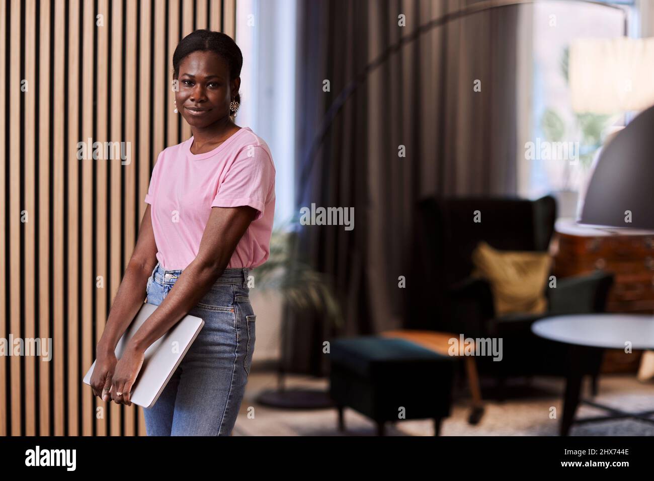 Young woman looking at camera Stock Photo