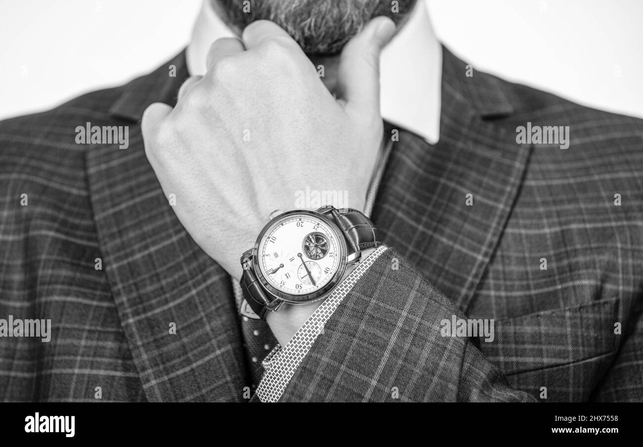 Class is timeless. Wristwatch worn on male arm wrist. Business