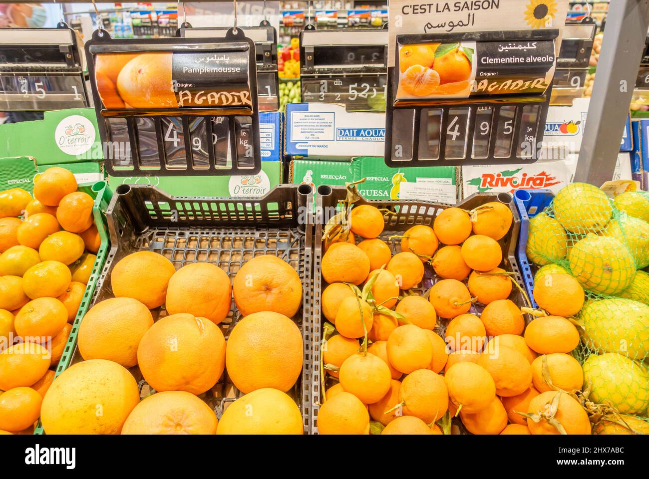 Fruits: oranges, clementines, tangerines sold on display inside the CarreFour supermarket in Marrakech, Morocco Stock Photo