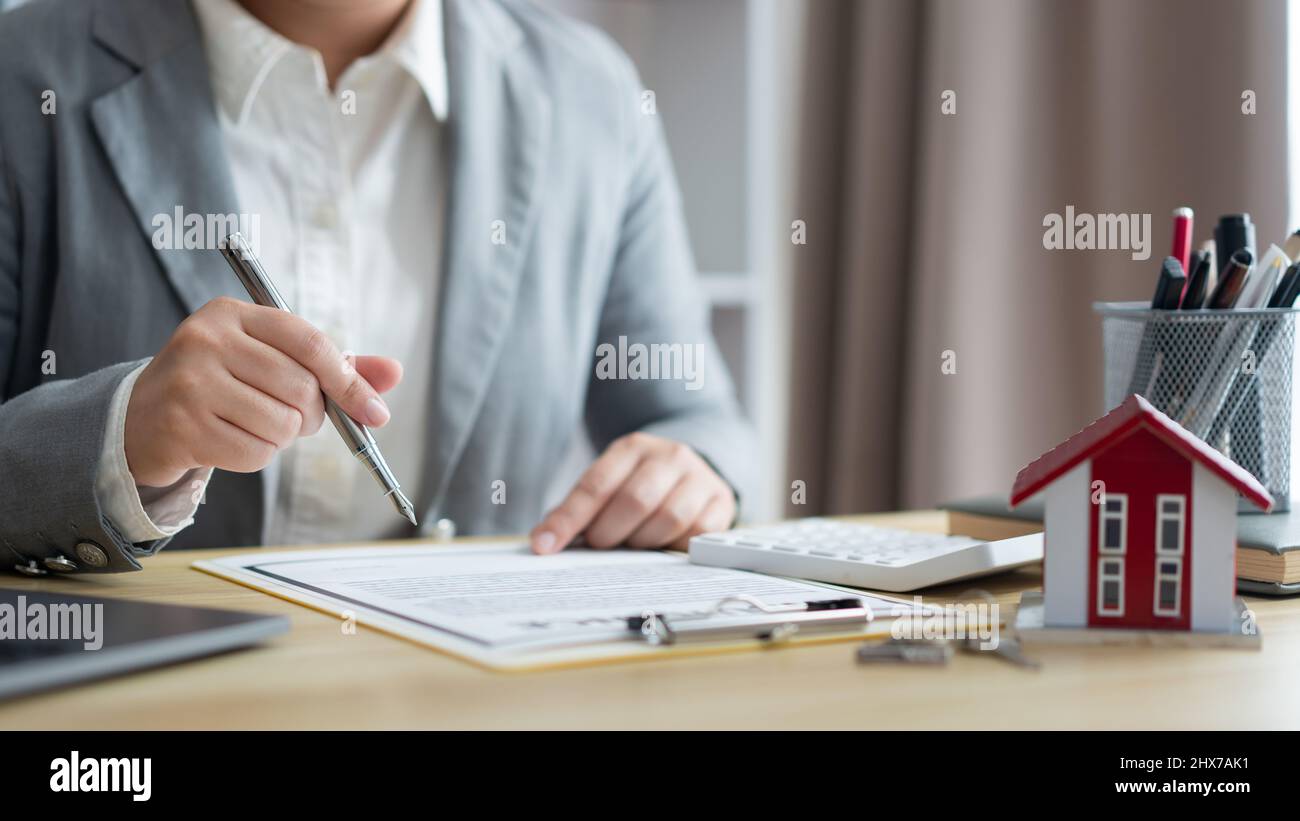 Insurance Document Reading Business trader reading document hi-res stock photography and images ...