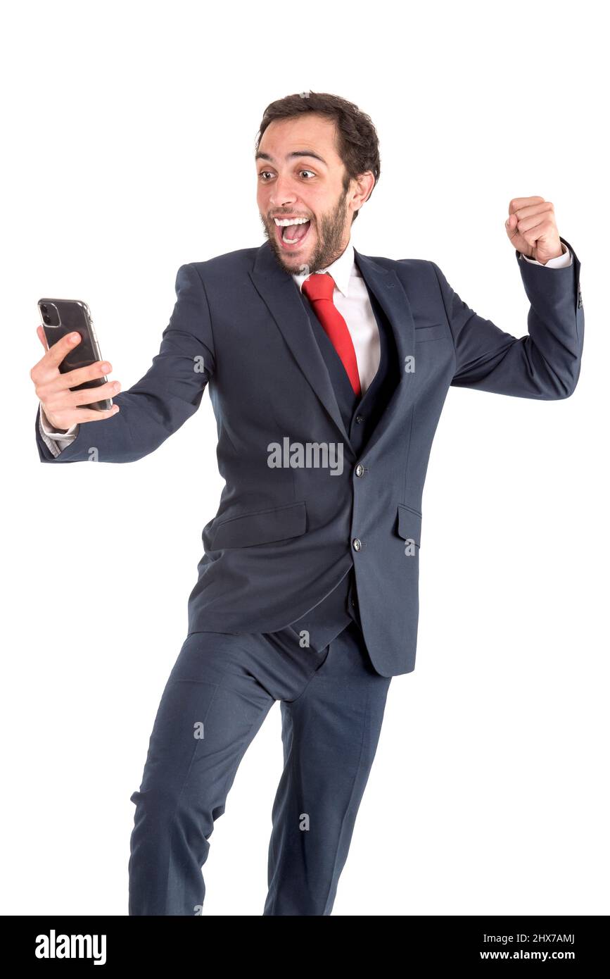Happy businessman or stock broker with mobile phone Stock Photo