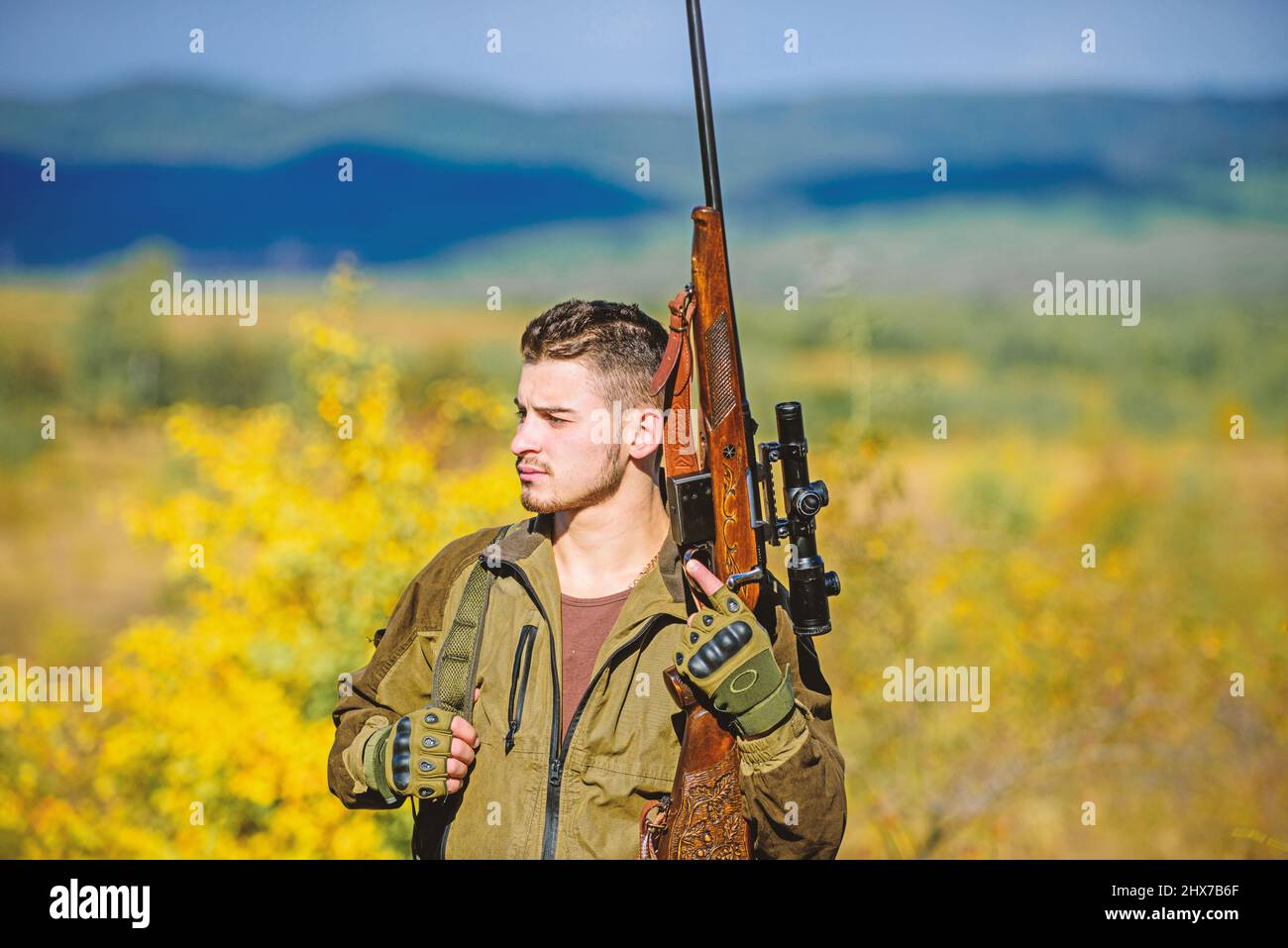 Guy bearded hunter spend leisure hunting on birds. Hunting masculine