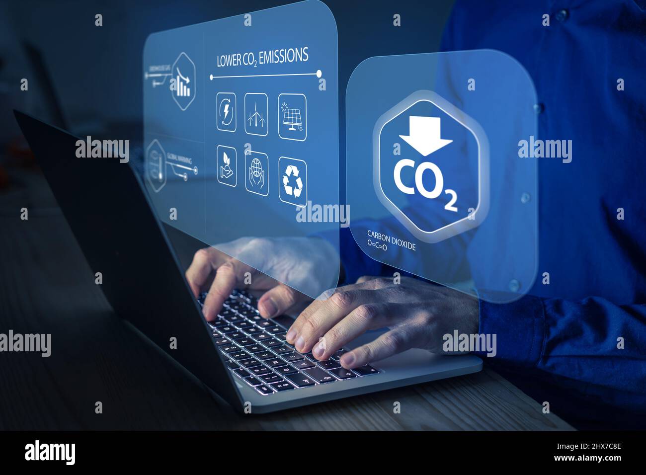 Lower CO2 emissions and carbon footprint to limit global warming and climate change. Net zero greenhouse gas and green business based on renewable ene Stock Photo
