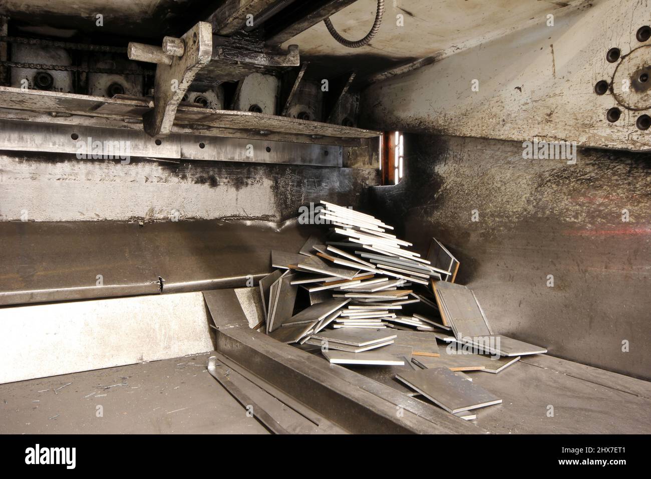 metal parts cut in guillotine machine Stock Photo Alamy