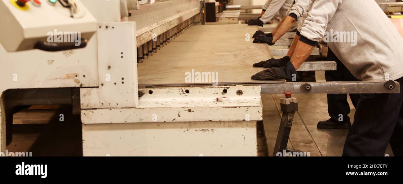 metal parts cut in guillotine machine Stock Photo - Alamy