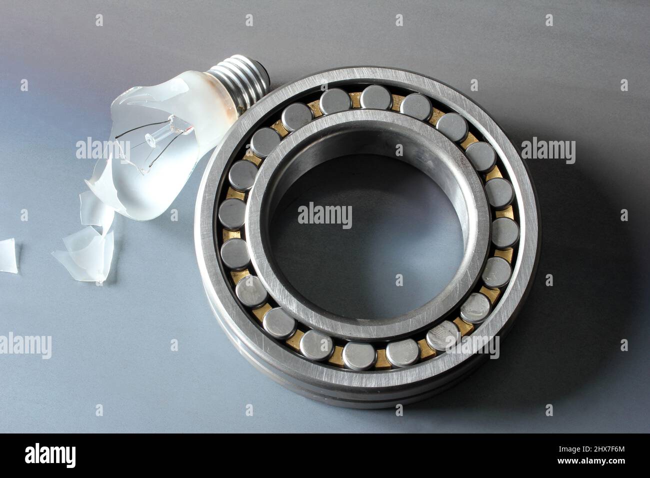 broken bulb and ball bearing Stock Photo Alamy