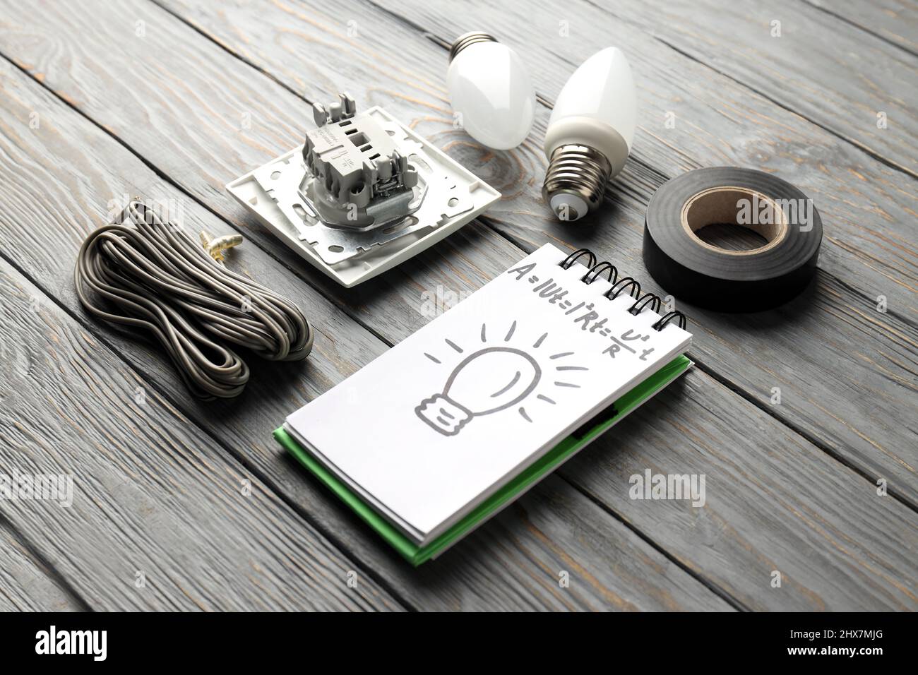 Electrician or electrical tools on wooden table Stock Photo