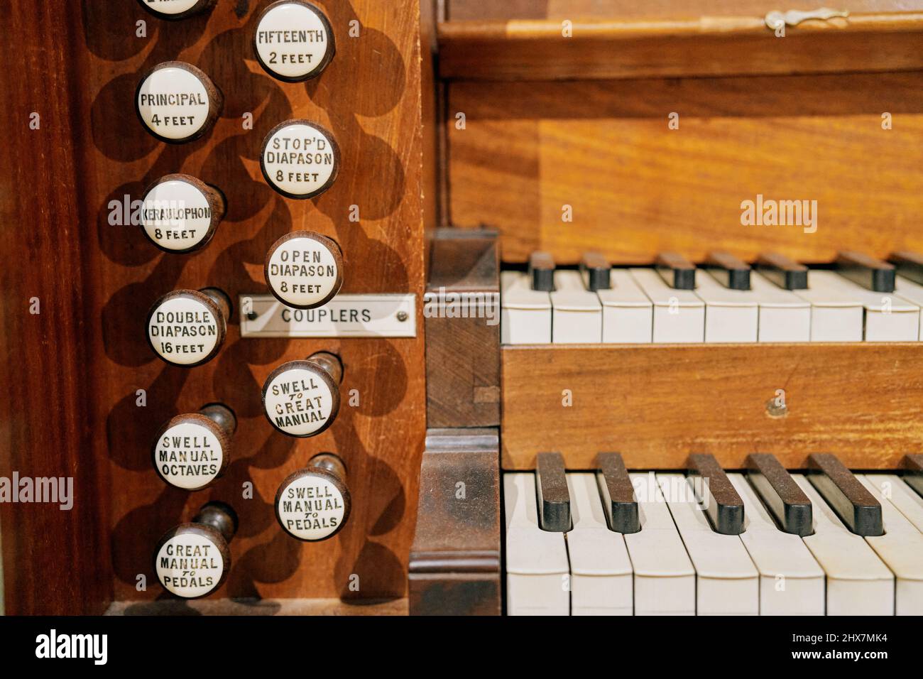 Close up of stops and keys on a pipe organ in the National Museum, Cardiff, South Wales Stock Photo