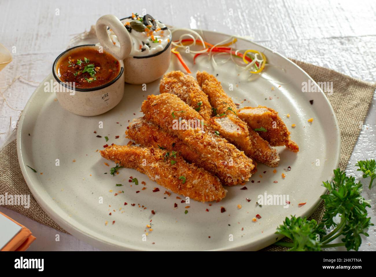 Fried chicken strips with dip Stock Photo - Alamy