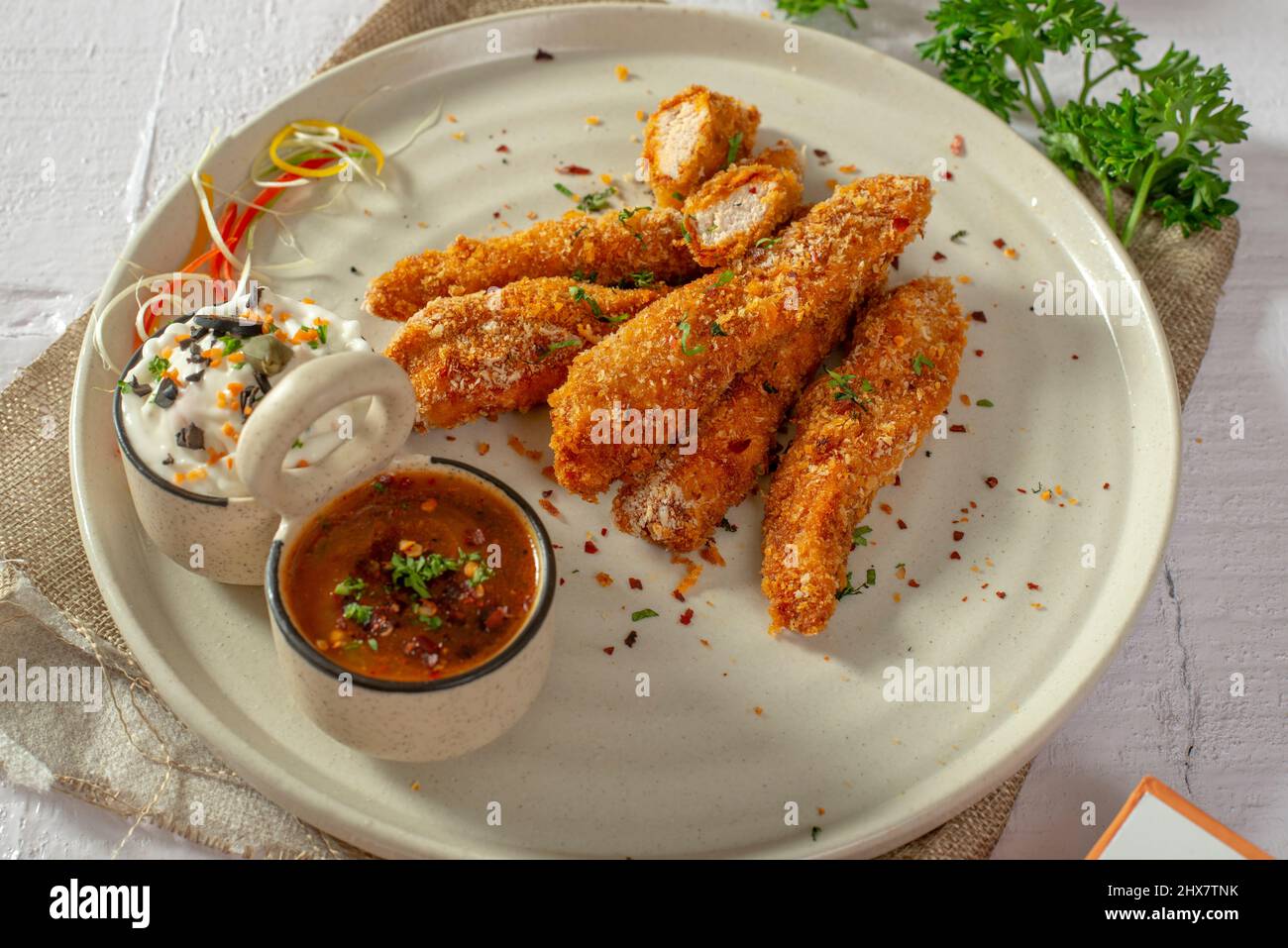 Fried chicken strips with dip Stock Photo - Alamy