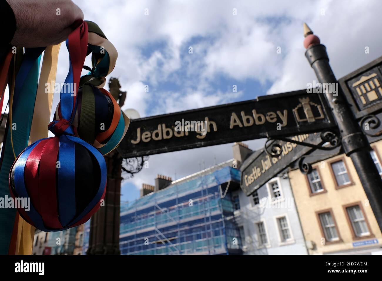 Jedburgh, Thursday 10 March 2022. Ceremonially decorated hand baÕs in the market place, held up for display ahead of the annual 'Fastern Eve Handba' event in Jedburgh's High Street in the Scottish Borders on March 10, 2022 in Jedburgh, Scotland. The annual event, which started in the 1700's, takes place today and involves two teams, the Uppies (residents from the higher part of Jedburgh) and the Doonies (residents from the lower part of Jedburgh) getting the ball to either the top or bottom of the town. The ball, which is made of leather, stuffed with straw and decorated with ribbons is thrown Stock Photo