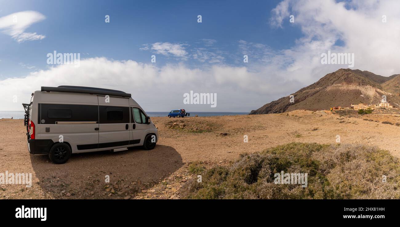 Cabo de Gata, Spain - 3 March, 2022: camper vans parked on a rocky beach on  the wild coast of Andalusia Stock Photo - Alamy