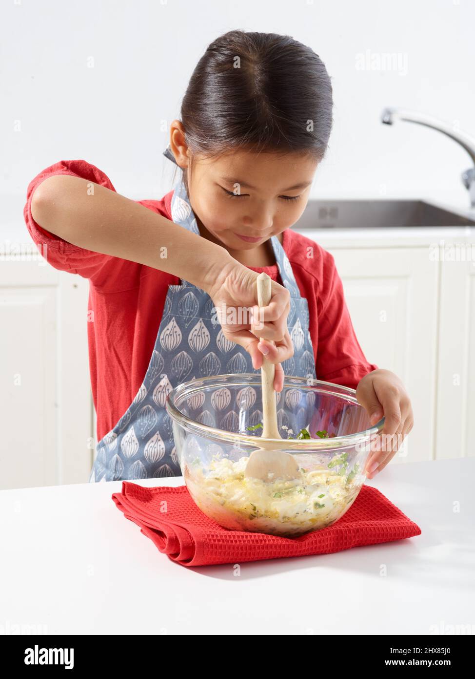 Tomato and Onion Tarts ÔøΩMixing cheese, eggs, basil in a bowl (Step 4