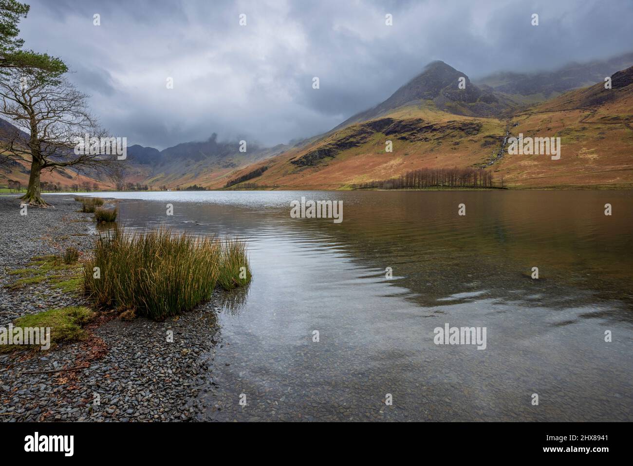 High Crag from the Buttermere shore in the winter, Lake District, England Stock Photo