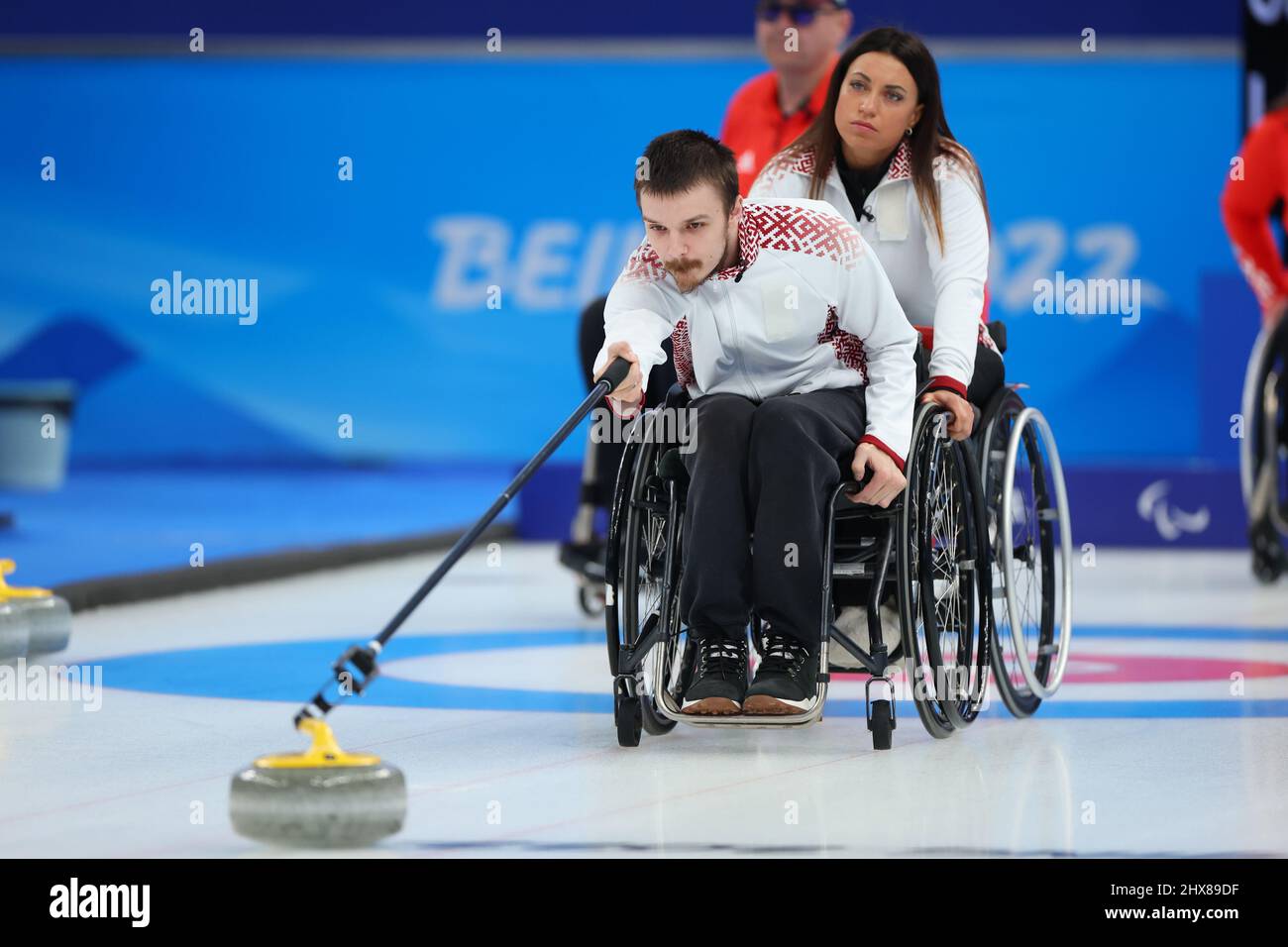 Beijing, China. 10th Mar, 2022. (LR) Sergejs Djacenko, Polina Rozkova