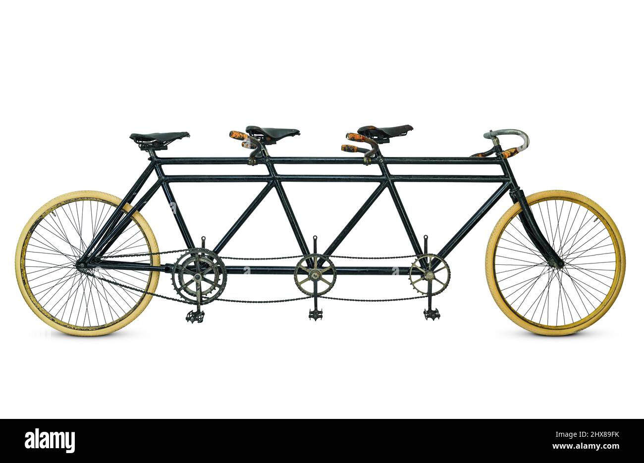 Adler Triplet, Frankfurt, Germany, 1897, side view, drive side. Number of gears: 0 Steel frame Wheel : 28' Special features: extra strong chains, but relatively light Stock Photo