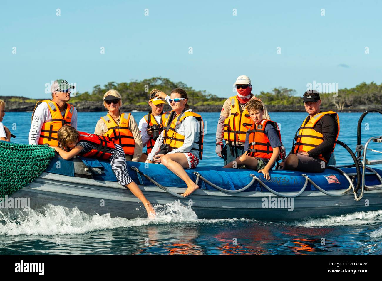 Tourists explore Isla Isabella from the water; Galagos Islands, Ecuador. Stock Photo