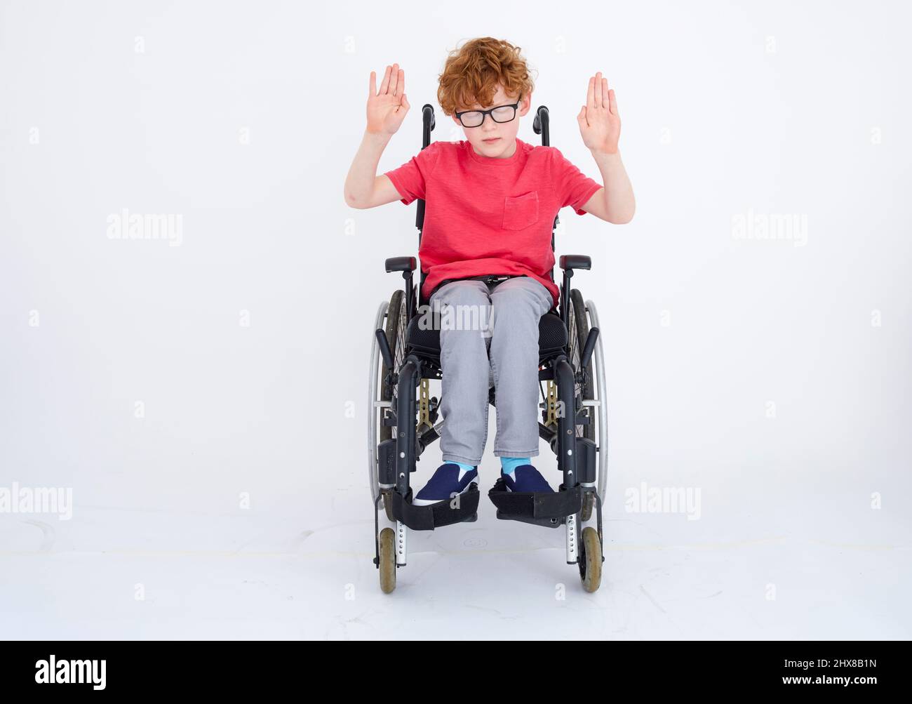 Boy in Send 10 Wishes Pose Stock Photo