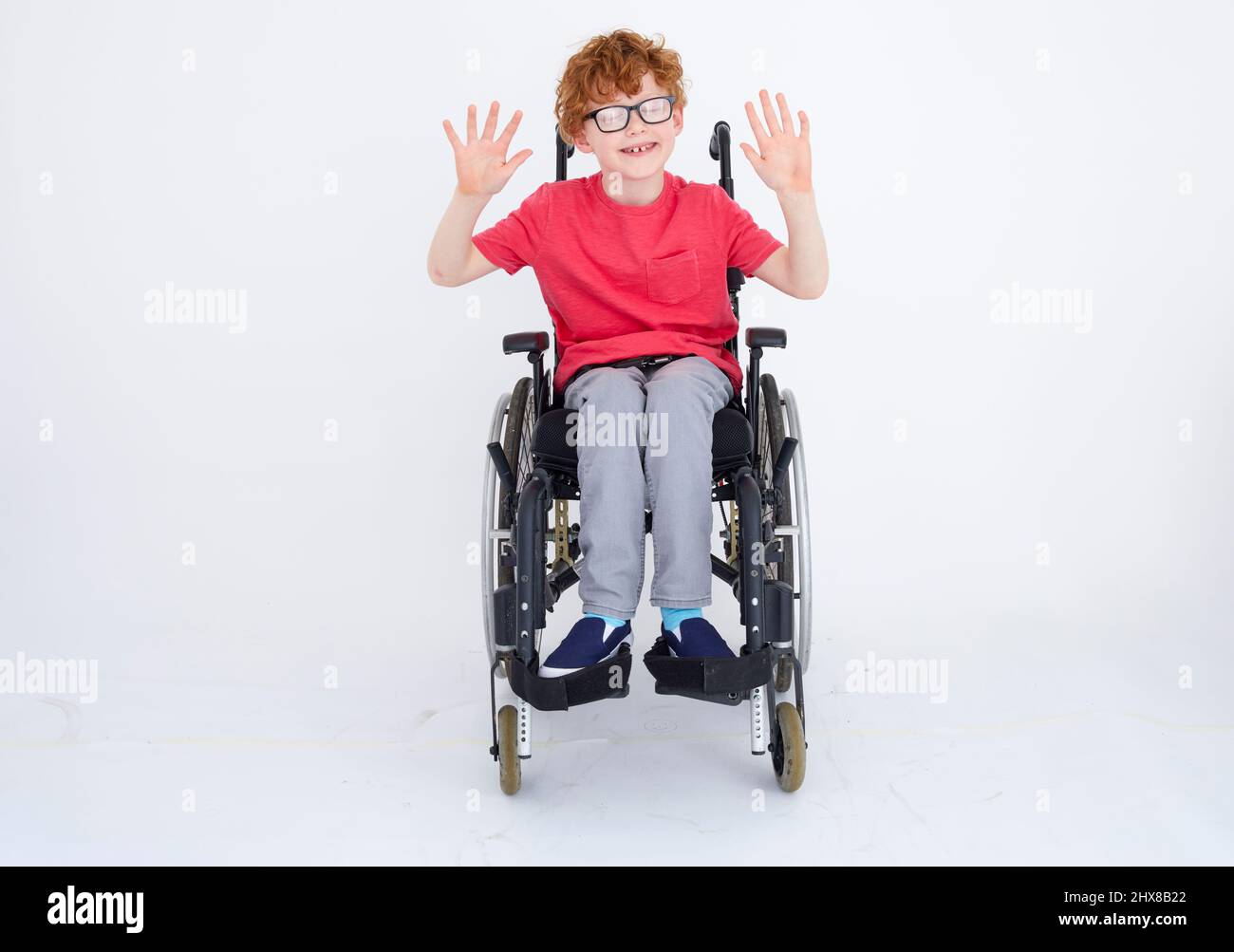 Boy in Send 10 Wishes Pose Stock Photo