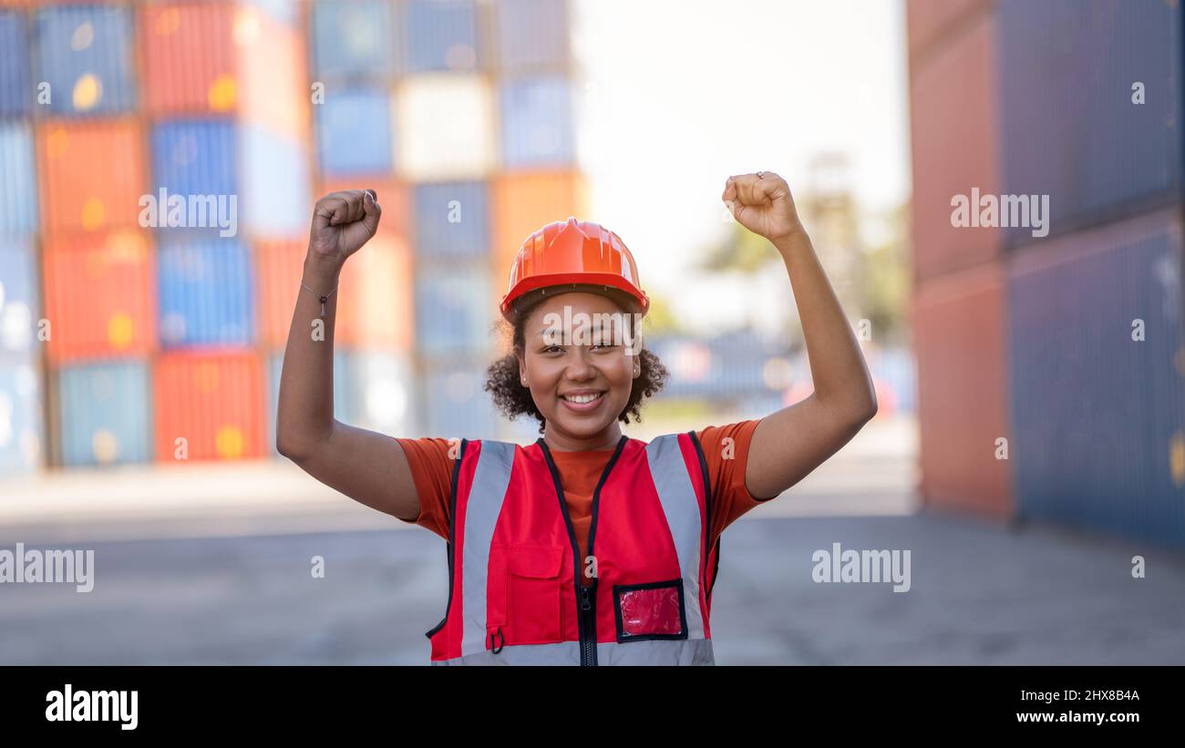 Foreman celebrating complete project by raising hands up Concept of