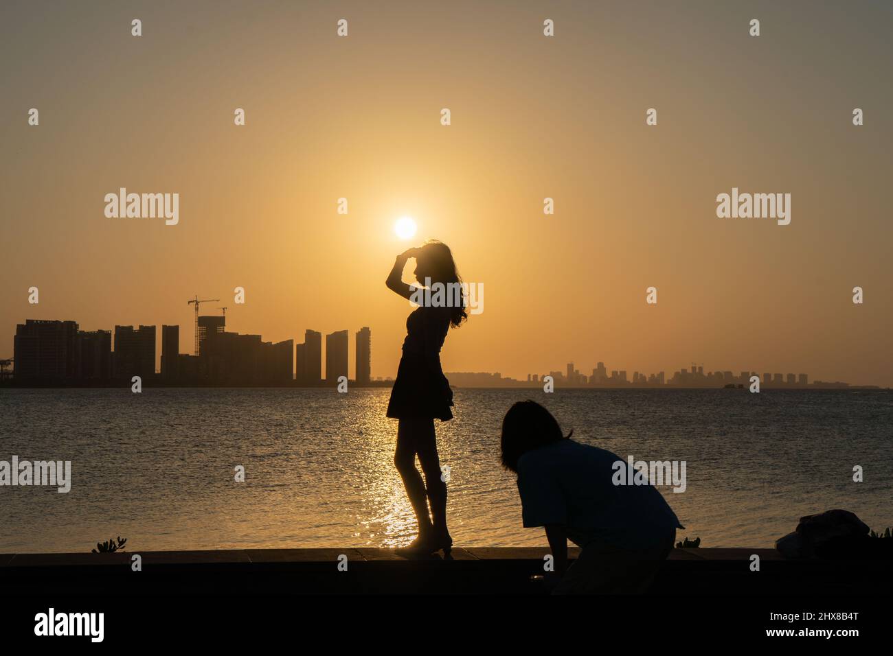 Woman poses photo under hi-res stock photography and images - Alamy