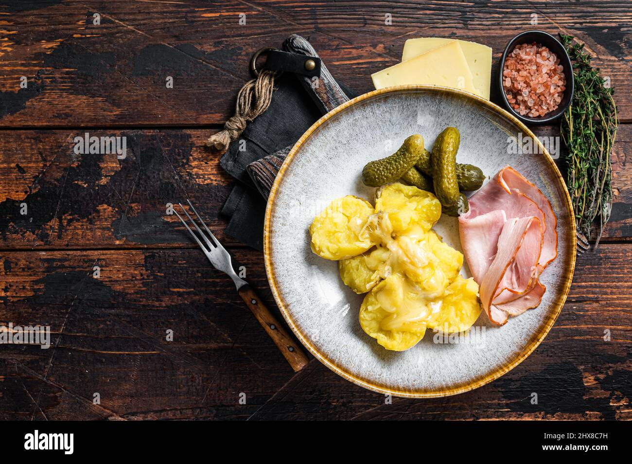 raclette cheese on a table Stock Photo - Alamy
