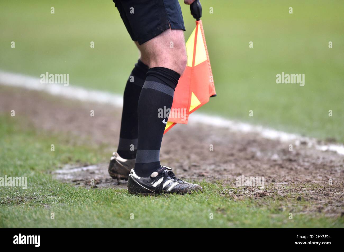 Football in mud hi-res stock photography and images - Alamy