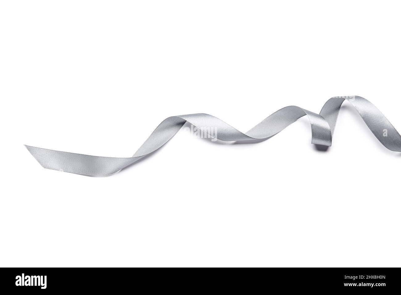 Curly silver ribbon on white background Stock Photo - Alamy