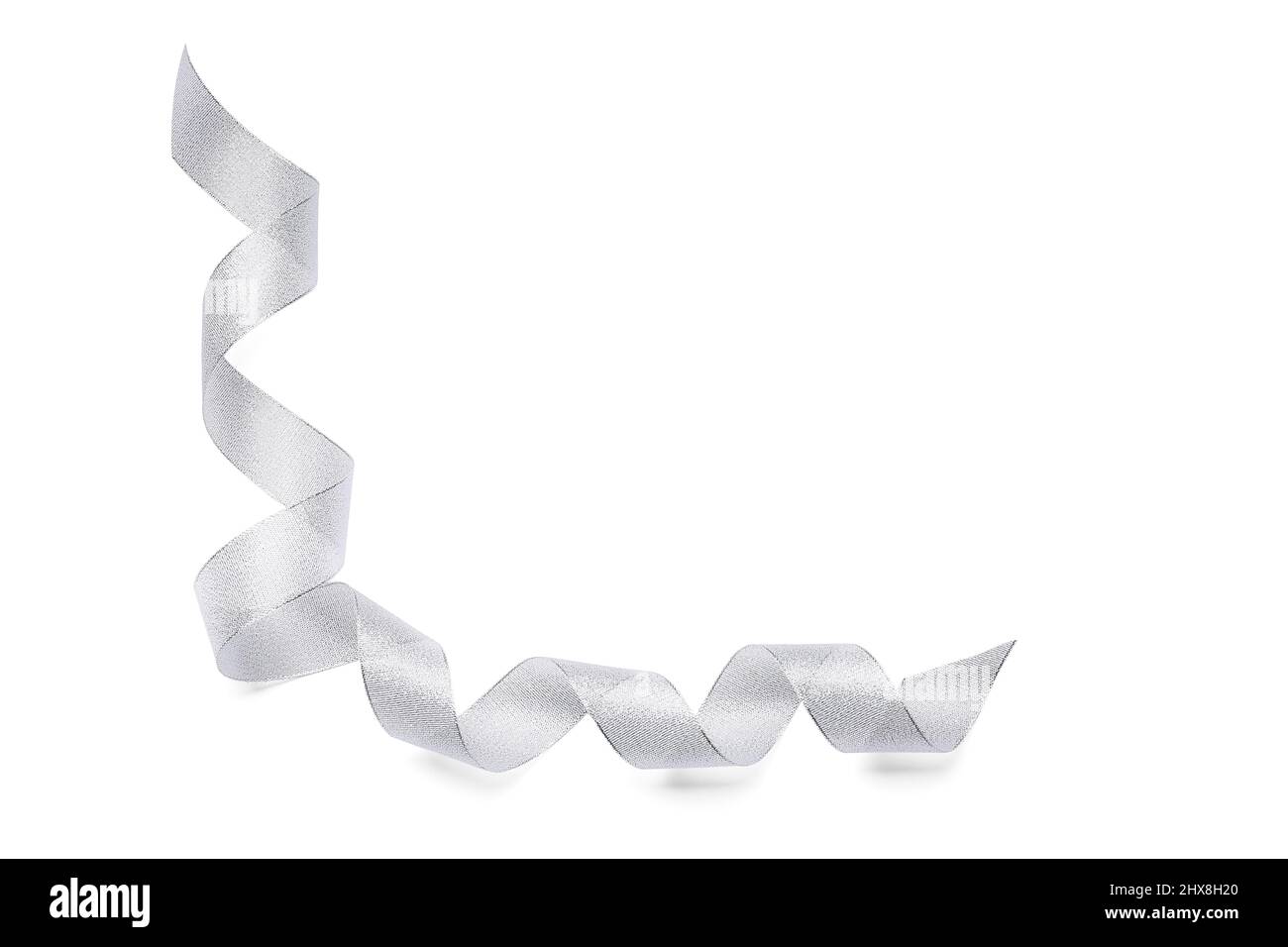 Curly silver ribbon on white background Stock Photo - Alamy