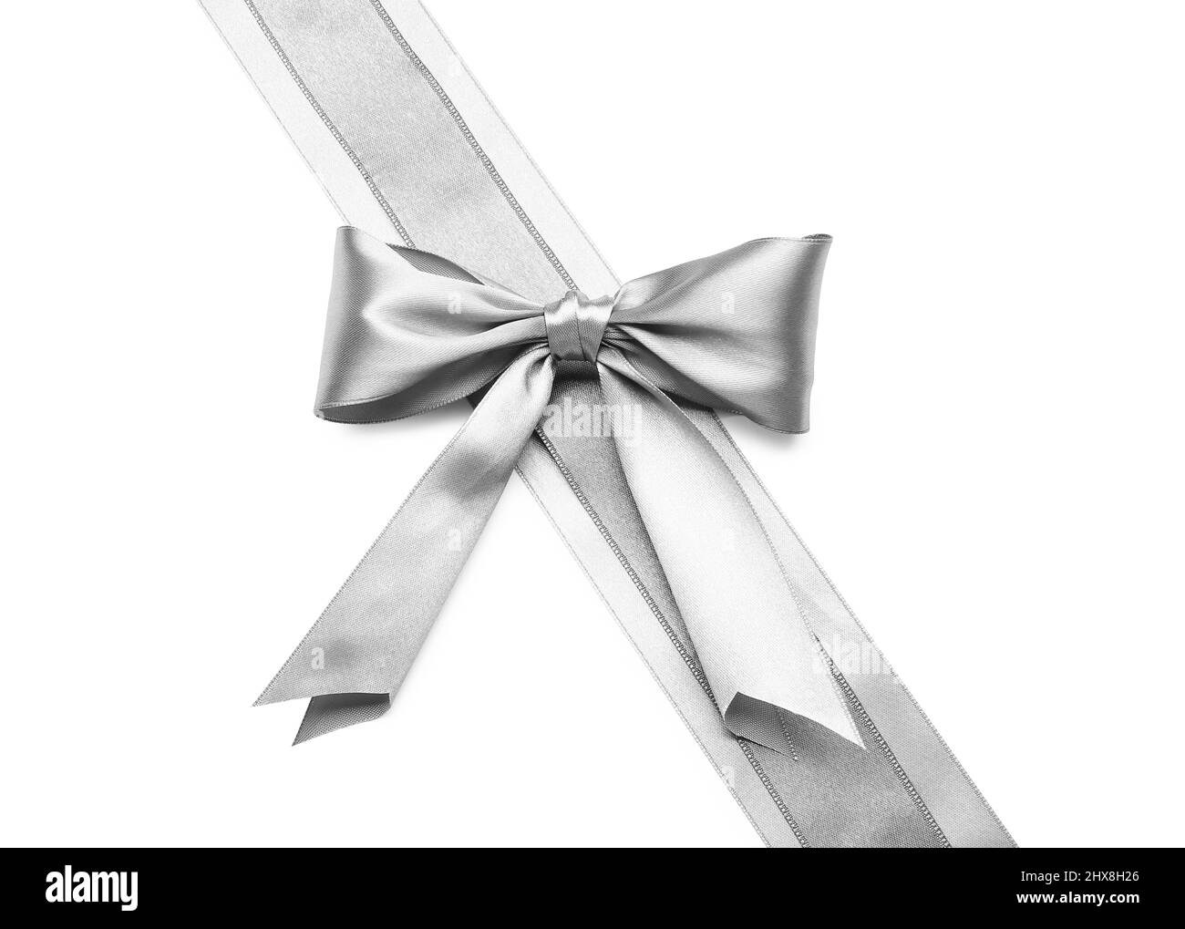 Beautiful silver bow with ribbons on white background Stock Photo - Alamy