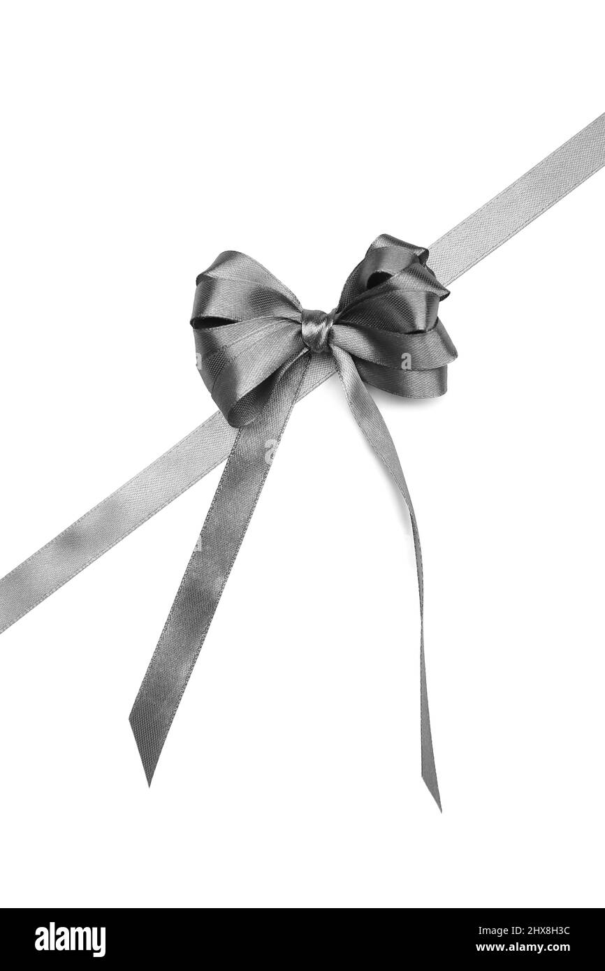 Beautiful silver bow with ribbon on white background Stock Photo - Alamy