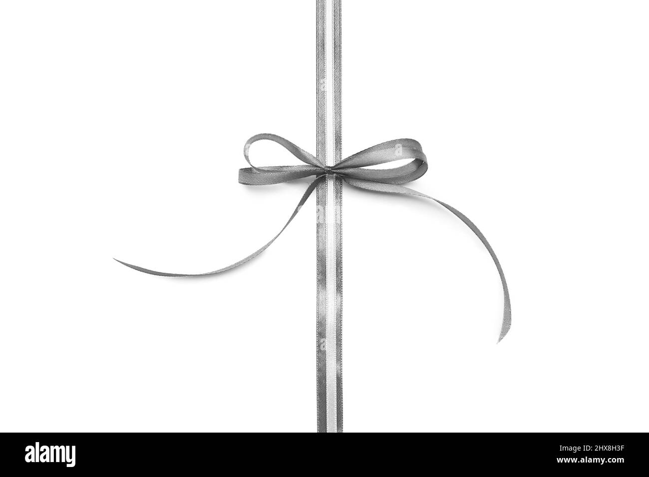 Beautiful silver bow with ribbons on white background Stock Photo - Alamy