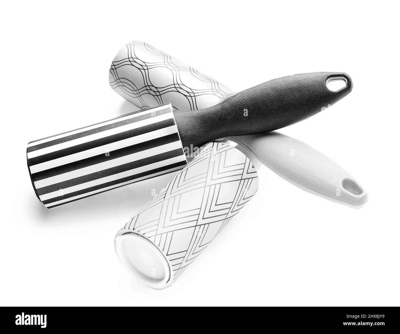 New lint rollers on white background Stock Photo Alamy