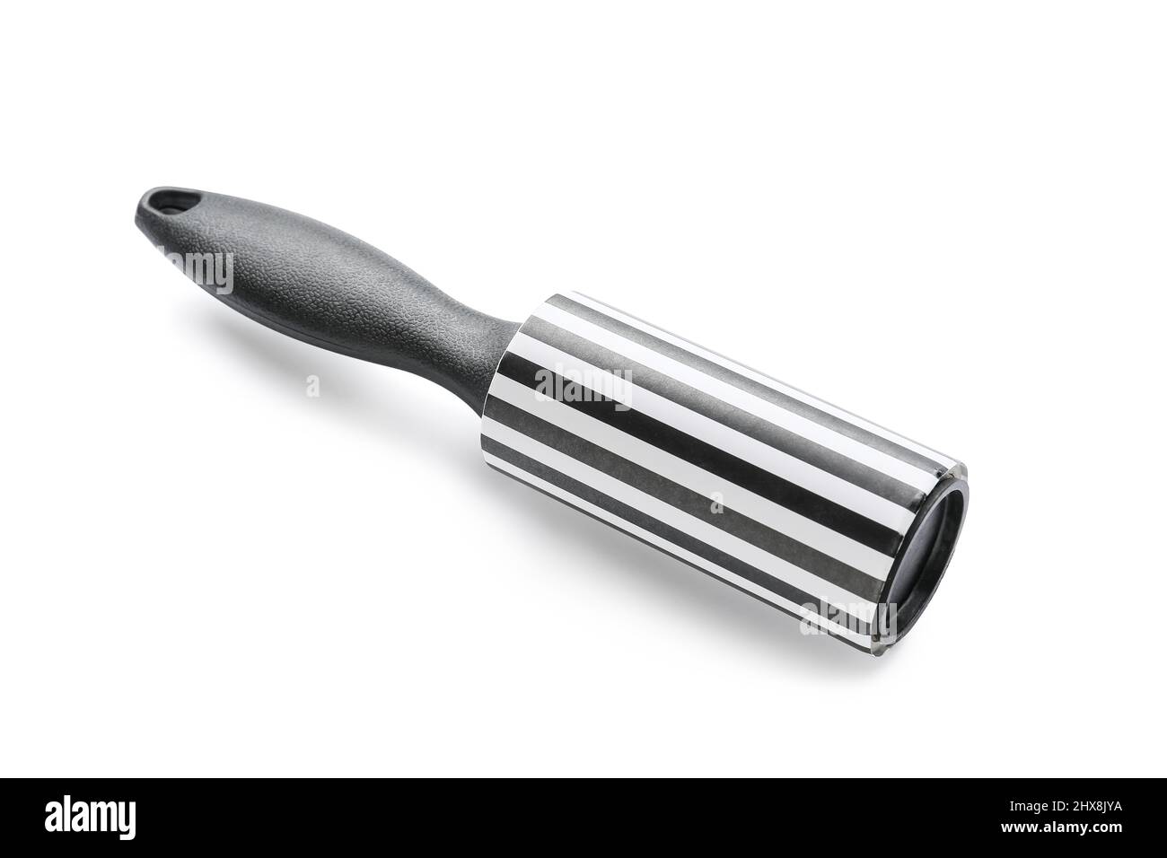 New lint roller on white background Stock Photo
