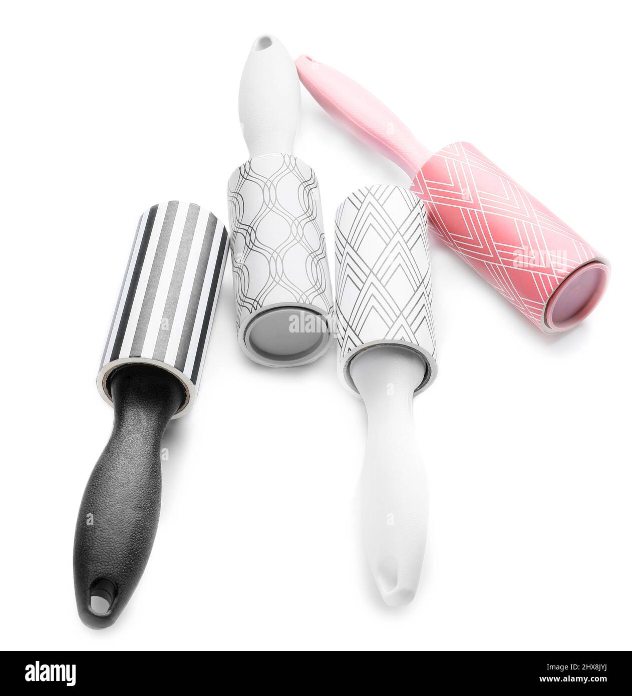 New lint rollers on white background Stock Photo Alamy