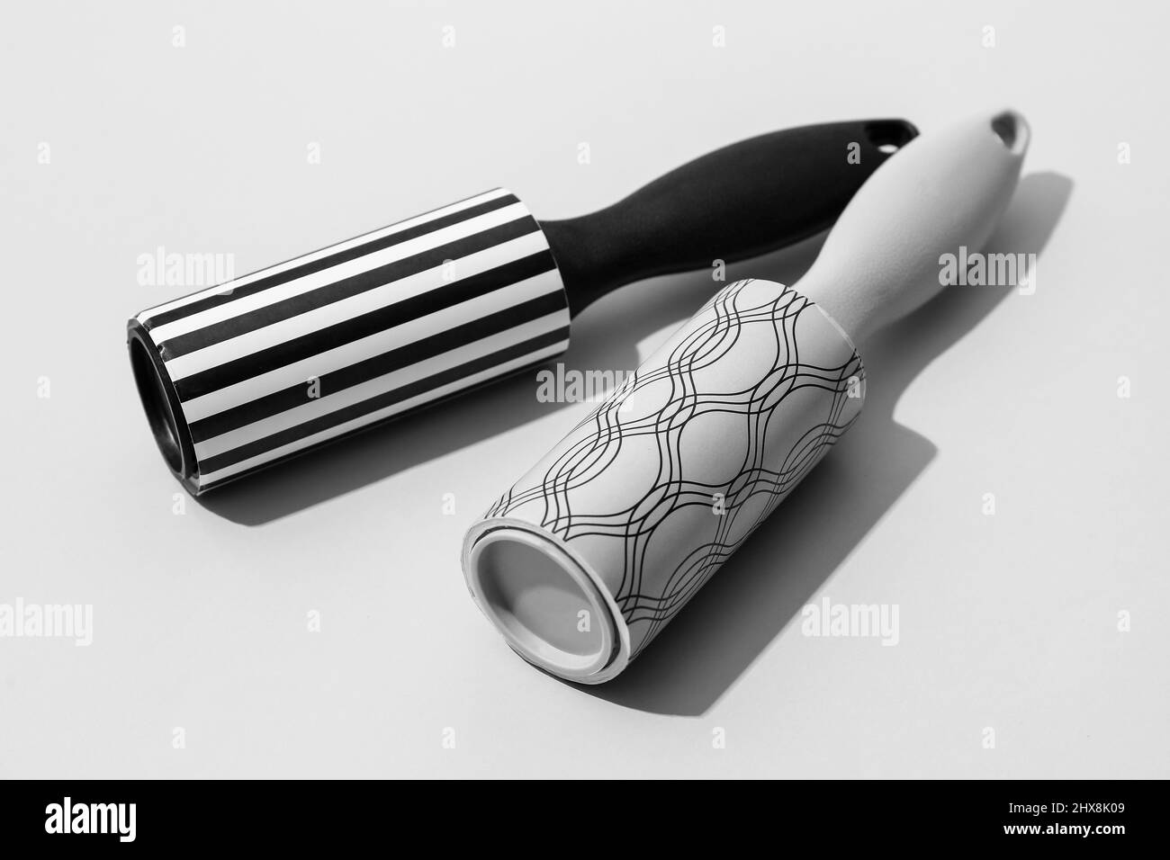 New lint rollers on light background Stock Photo