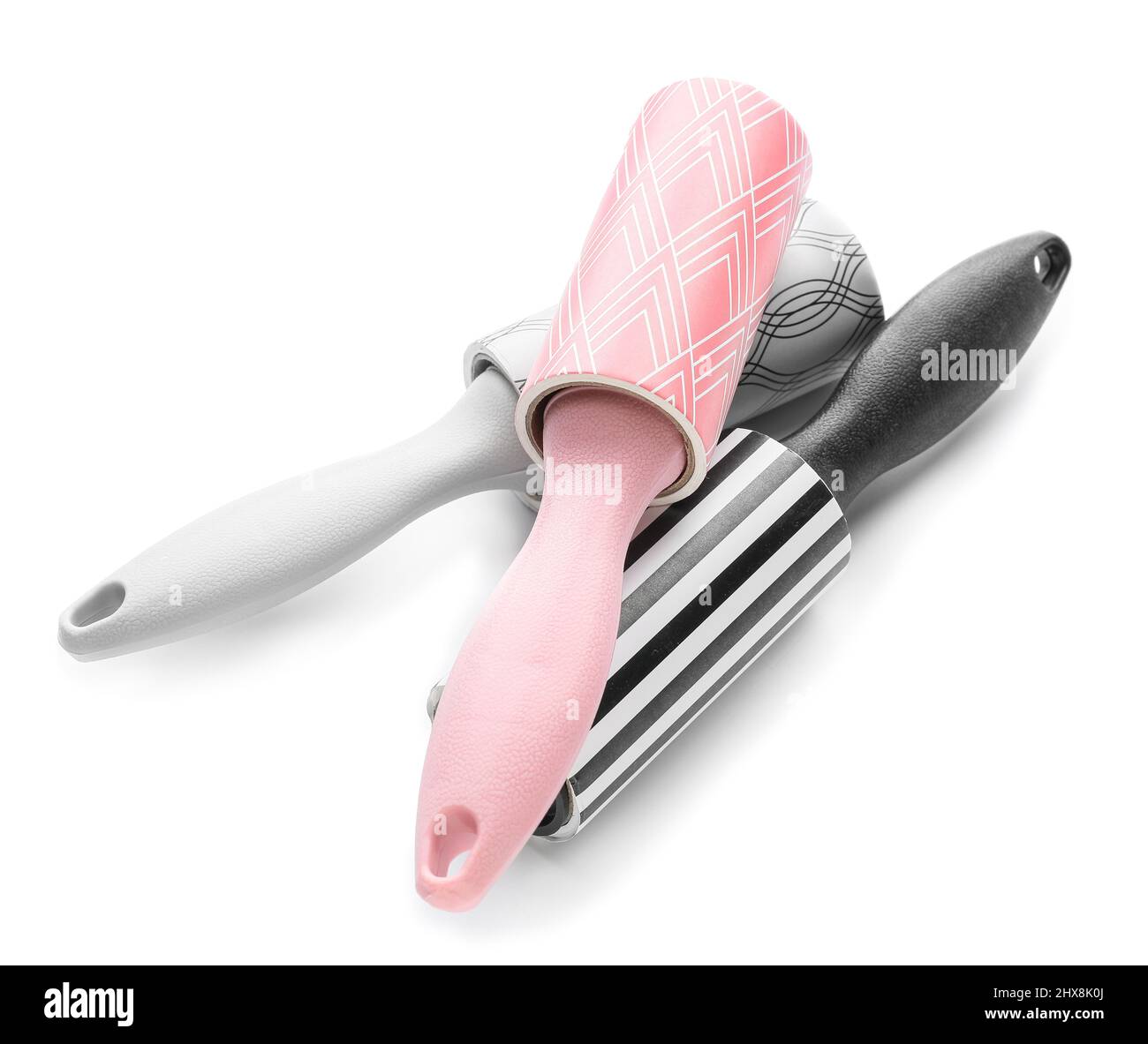 New lint rollers on white background Stock Photo