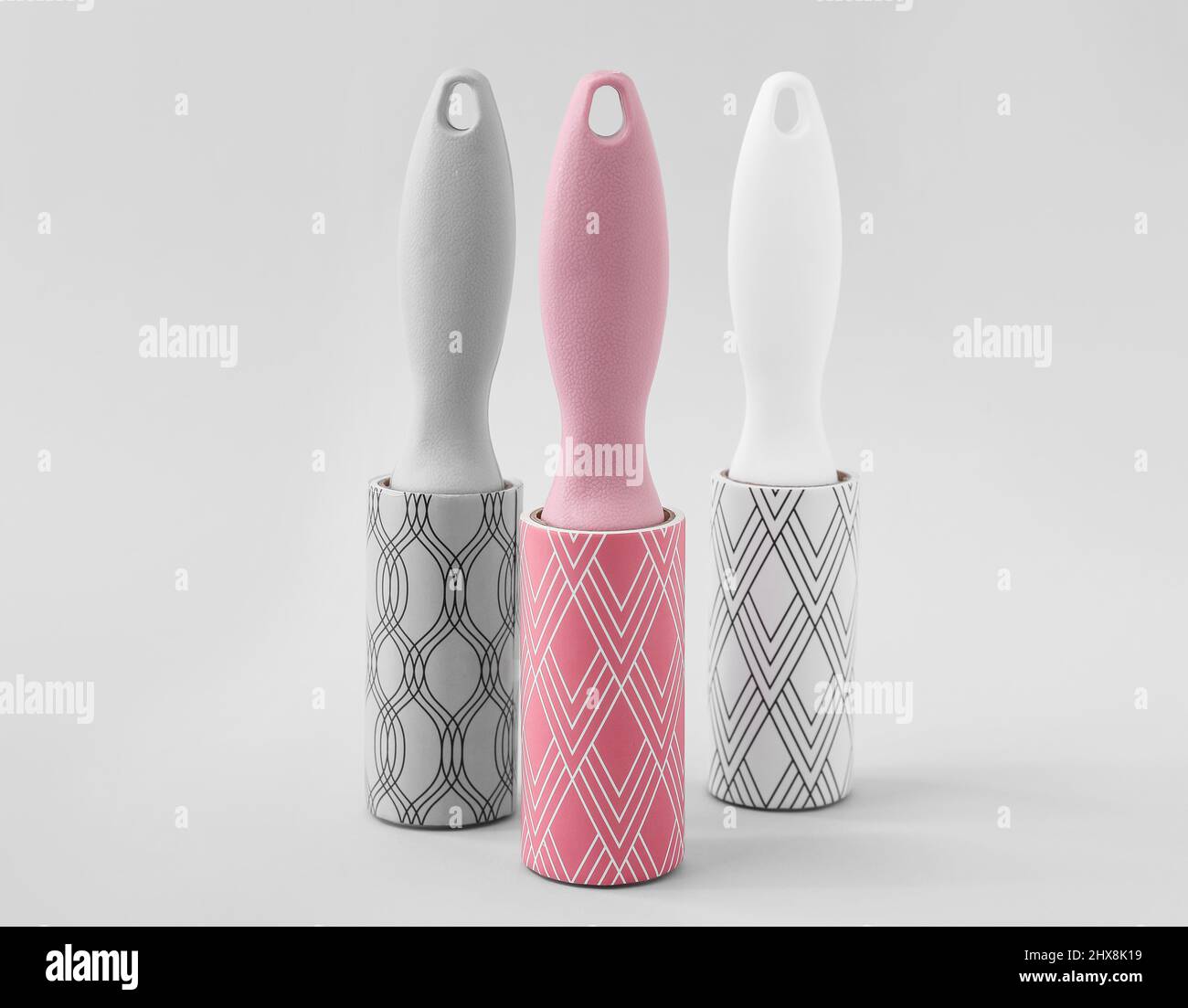 New lint rollers on light background Stock Photo