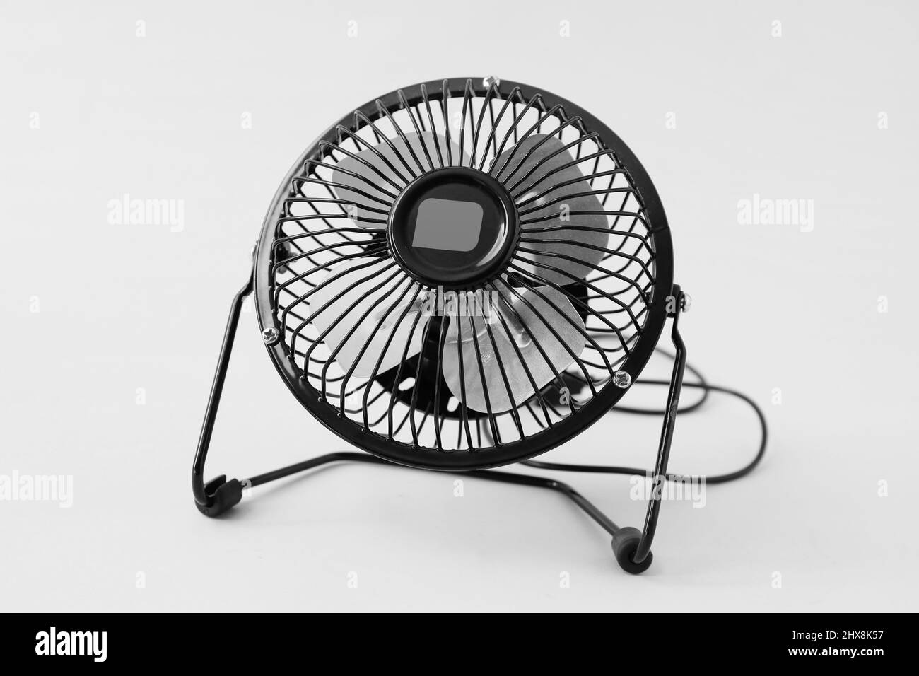Desktop cooling fan on grey background Stock Photo