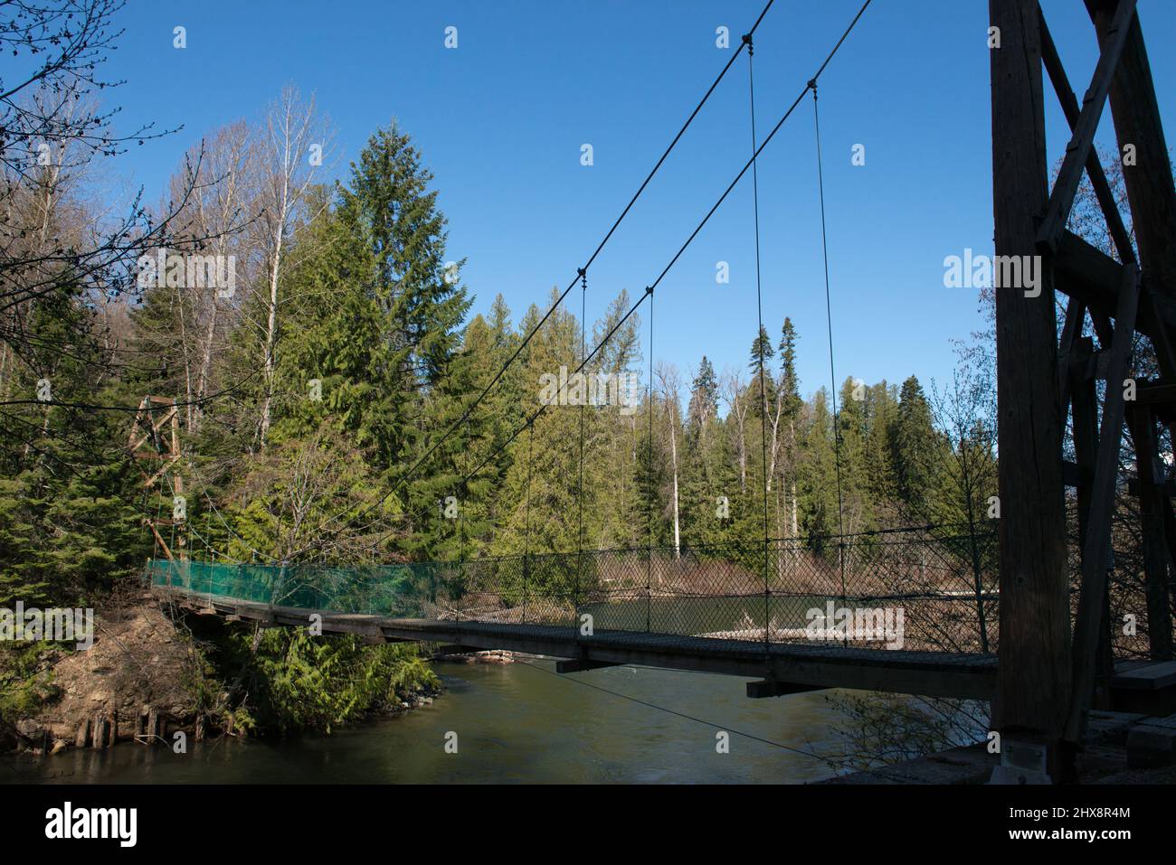 Man walking suspension bridge hi-res stock photography and images - Alamy