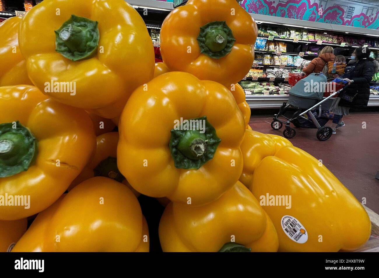 A person shops at a Trader Joe's grocery store in the Manhattan borough of New York City, New York, U.S., March 10, 2022.  REUTERS/Carlo Allegri Stock Photo