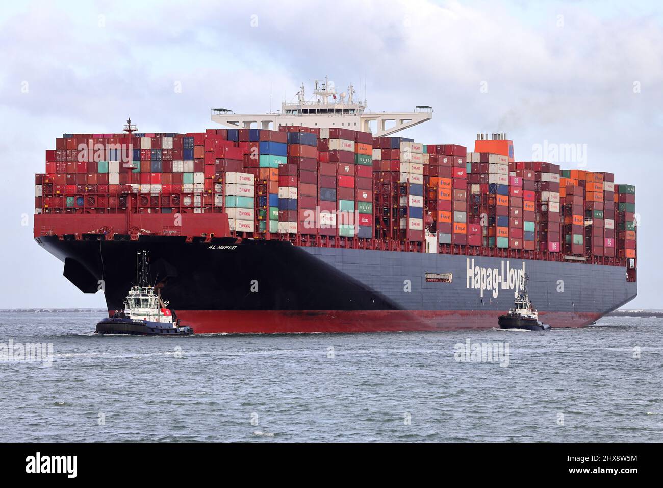 The container ship Al Nefud arrives in the port of Rotterdam on January 30, 2022. Stock Photo