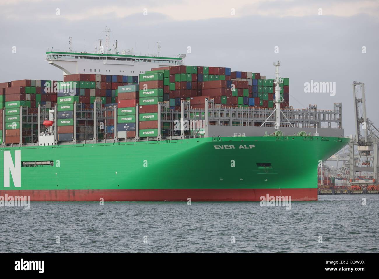 The container ship Ever Alp leaves the port of Rotterdam on January 30, 2022. Stock Photo